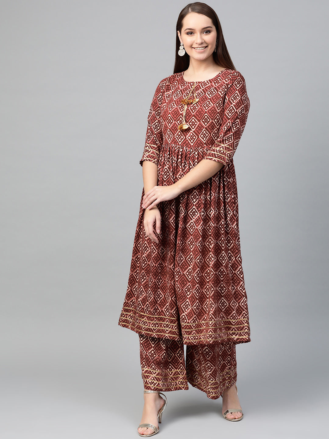 Ahalyaa Women Maroon & Off White Printed A-Line Kurta with Palazzos